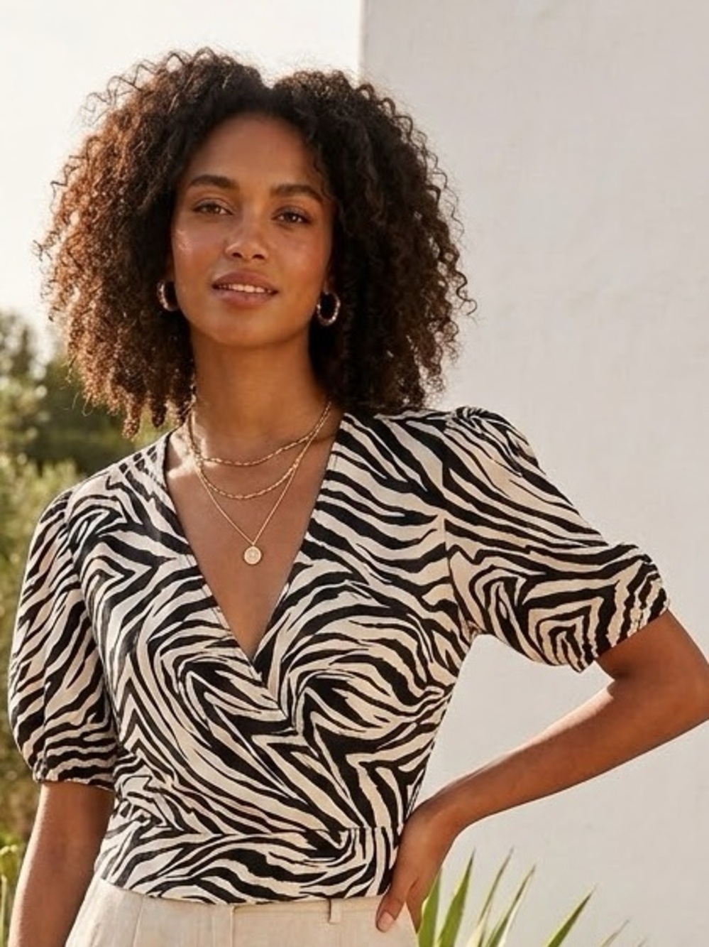 Zebra-Print Wrap-Style Top in Cream and Black